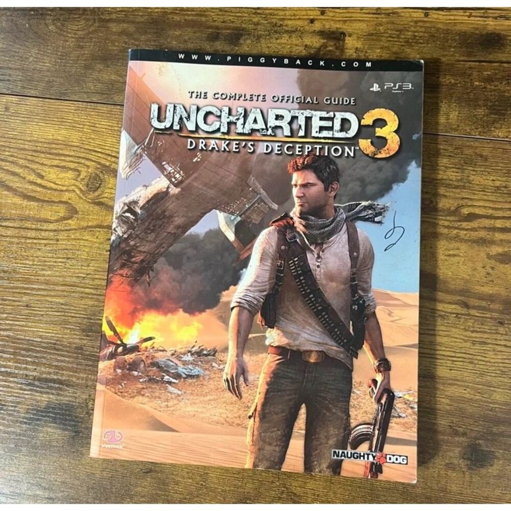Uncharted 3: Drake's Deception Strategy Guide Book (Sony PlayStation 3)